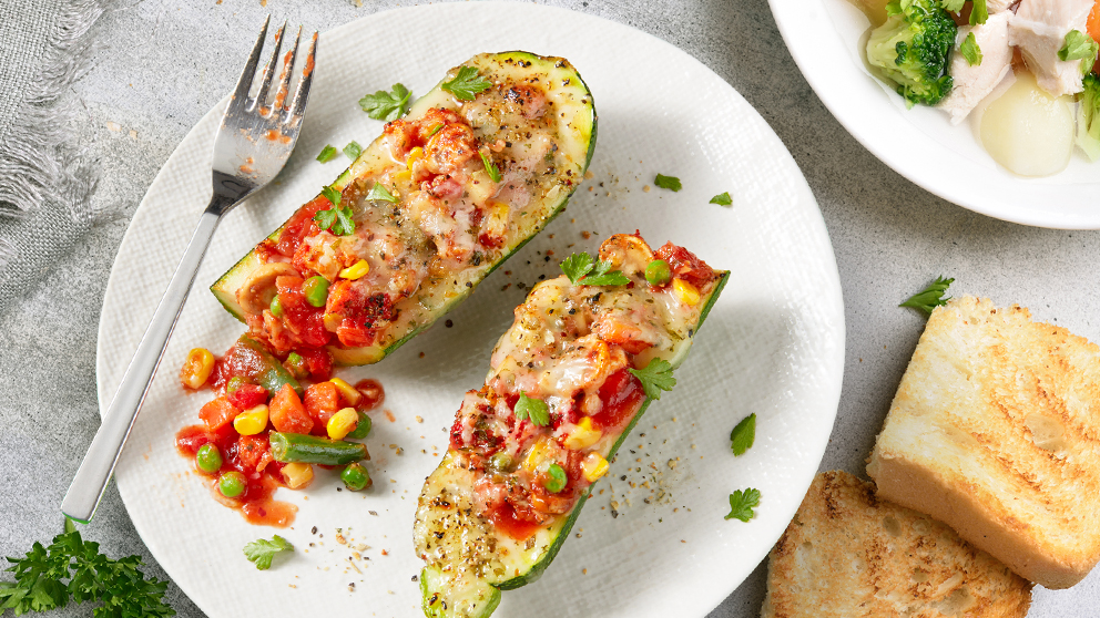 Image of Garden Mixed Vegetable Zucchini Boats with Cheese Recipe