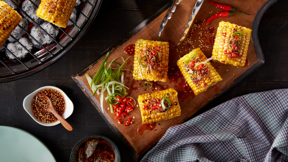 Image of GRILLED CORN ON THE COB WITH SPICY CHILI SESAME SAUCE