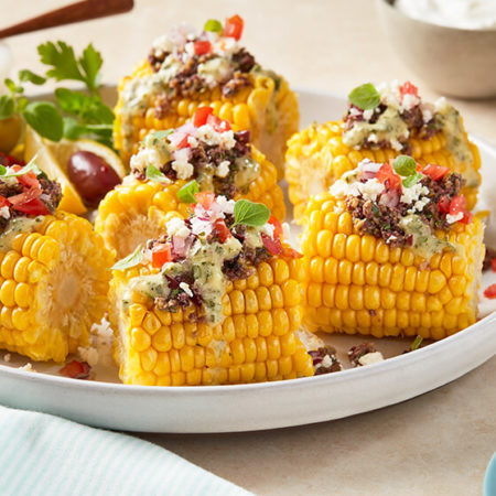 Image of GREEK-STYLE LOADED CORN ON THE COB Recipe